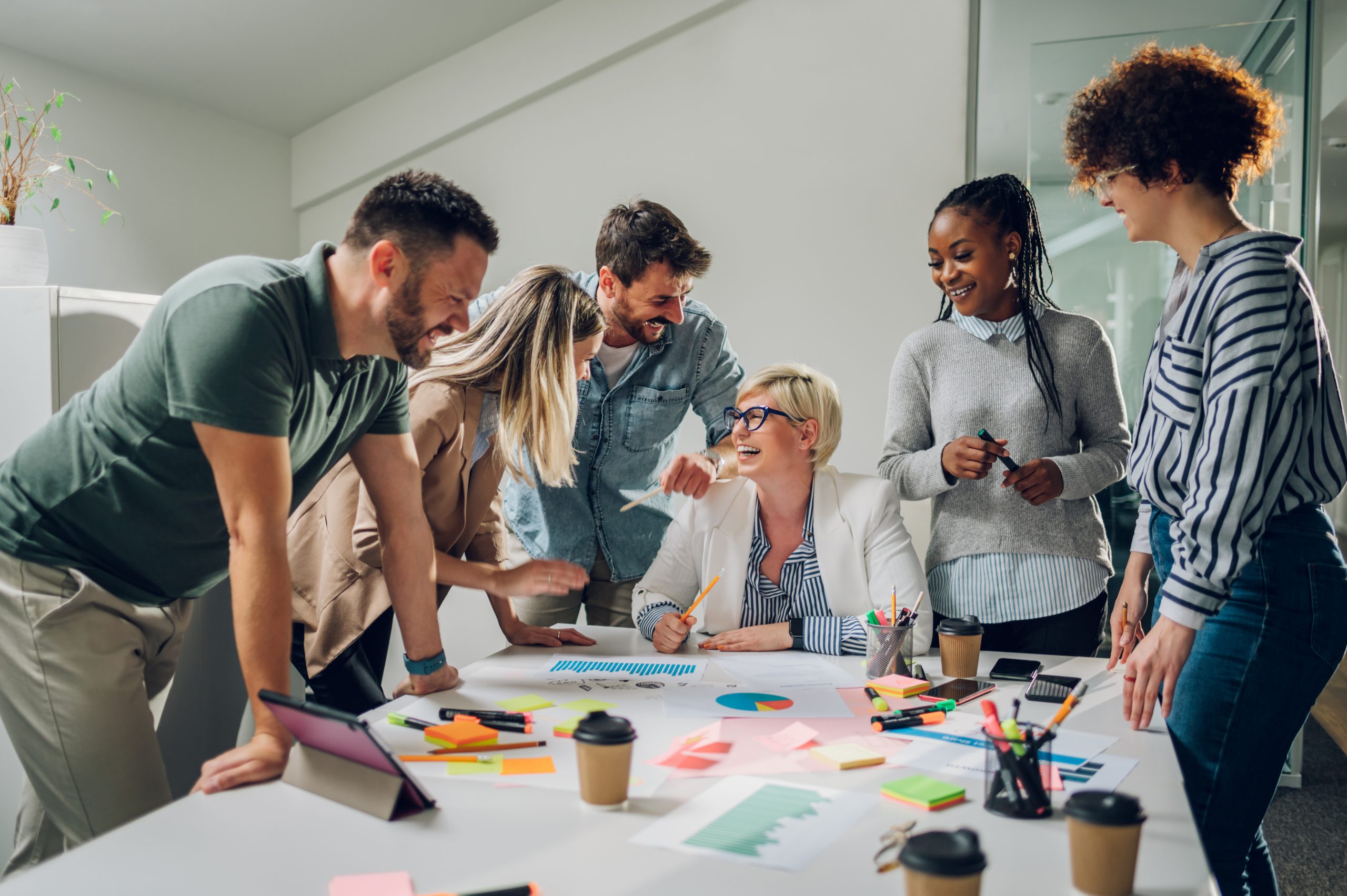 Group of diverse business people working together and having a m